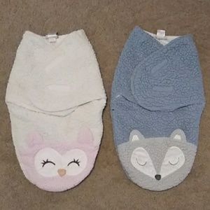 Boy and girl baby swaddles